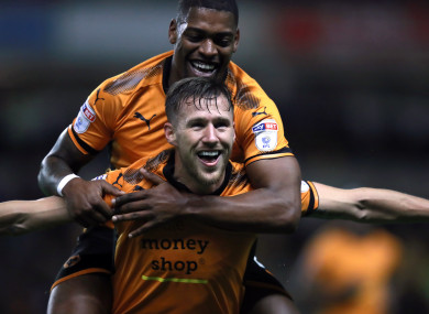 Wolverhampton Wanderers' Barry Douglas (bottom) celebrates scoring his side's first goal.