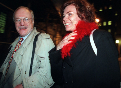 In this 7 December 1999, file photo, attorney Michael Carey, left, and his client Annette Sorensen leave New York's U.S. District court after the second day of trial of her $20 million lawsuit against the city