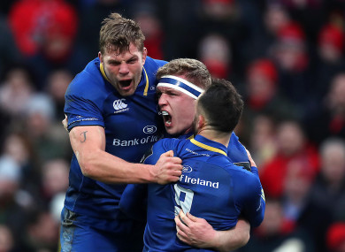 Jordi Murphy and Jamison Gibson-Park celebrate Dan Leavy's try.
