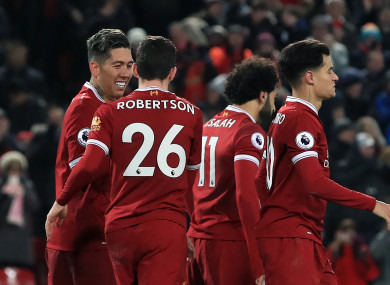 Roberto Firmino celebrates scoring his second goal on Tuesday.