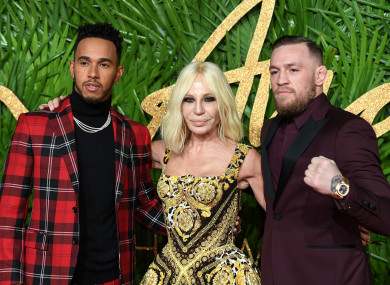 Conor McGregor with Lewis Hamilton and Donatella Versace at the 2017 Fashion Awards in London this week.