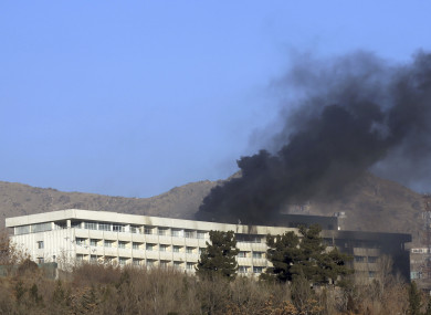 Black smoke rises from the Intercontinental Hotel.