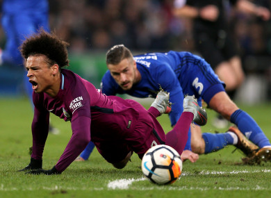 Manchester City's Leroy Sane after being tackled by Cardiff City's Joe Bennett.