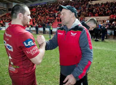 Captain Ken Owens and head coach Wayne Pivac celebrate.