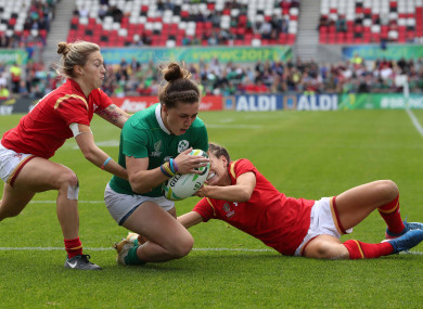 Katie Fitzhenry, pictured here scoring a try at the Women's World Cup last year, returns to the team.