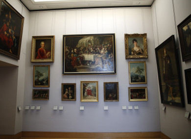 FILE: Paintings looted by Nazis during World War II, are on display at the Louvre museum, in Paris. In a move aimed at returning work of art looted by Nazis during World War II, the Louvre museum has opened two showrooms with 31 paintings on display which can be claimed by their legitimate owners.