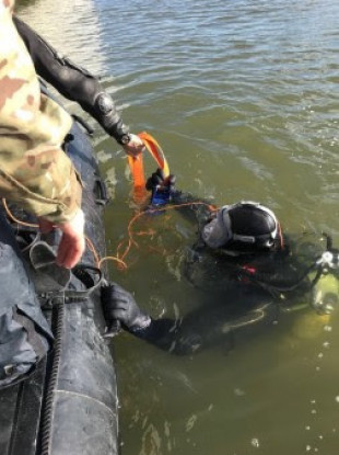 A Royal Navy diver assisting in the operation yesterday.