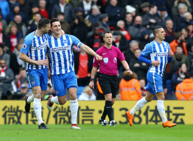 Shane Duffy (left) celebrates with Brighton goalscorer Lewis Dunk.