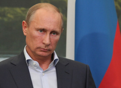 Russian President Vladimir Putin looking despondent.
