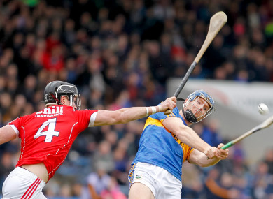Jason Forde hits a point despite pressure from Colm Spillane.