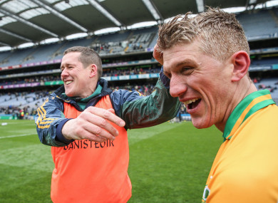 Corofin's Kieran Fitzgerald celebrates with manager Kevin O'Brien.