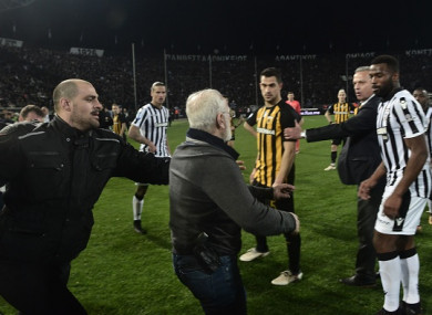 Ivan Savvidis, seen here with a handgun in his waistband, invaded the pitch after his side's defeat to AEK Athens.