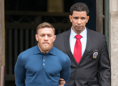 Conor McGregor is taken from the 78th Precinct in Brooklyn last month.