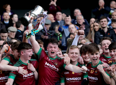 St. Ronan's Jamie Haughey lifts the trophy.