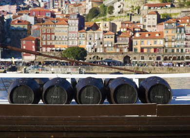 Five wine barrels in Porto, Portugal.