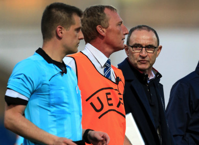 Martin O'Neill speaking to referee Zbynek Proske after Ireland's defeat to the Netherlands in the European U17 Championship quarter-finals.