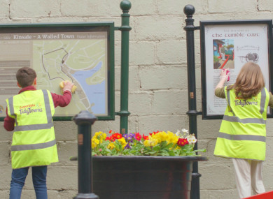 Two young volunteers helping out.
