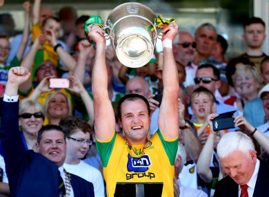Donegal captain Michael Murphy lifts the cup.