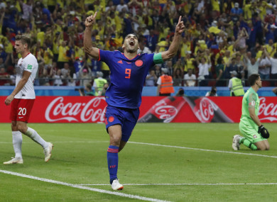 Colombia's Radamel Falcao, centre, celebrates after scoring.