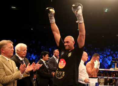 Tyson Fury (right) and Frank Warren (left) after the International Heavyweight bout at the Manchester Arena.