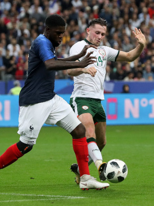 Ireland's Alan Browne challenging Samuel Umtiti of France.