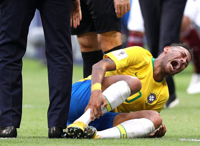 Neymar injured during Brazil's World Cup last 16 clash against Mexico.