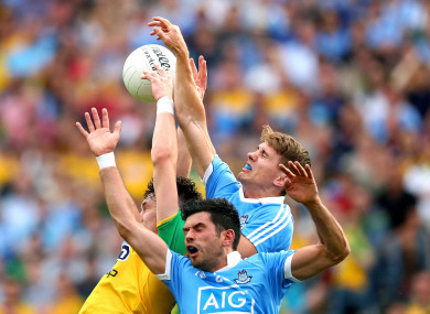 Dublin and Donegal players battle for aerial possession.