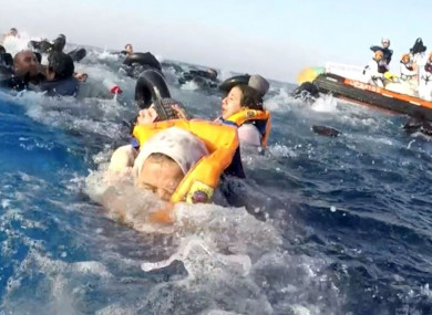 Refugees being rescued by the Italian Coast Guard after a boat capsized in the Mediterranean Sea in April.