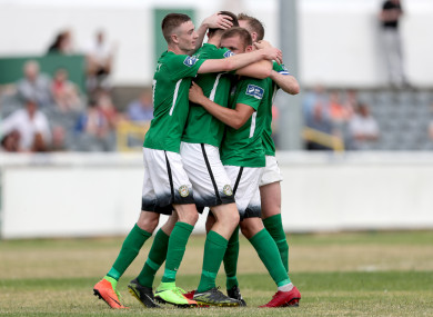Sean Heaney celebrates with teammates after scoring a second-half winner.
