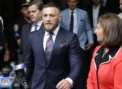 Conor McGregor exits the courthouse yesterday