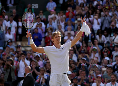 Kevin Anderson celebrates his win against Roger Federer.