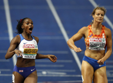 Asher-Smith celebrates as she crosses the line in Berlin.