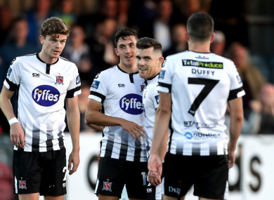 Dundalk's Jamie McGrath celebrates scoring a goal with team-mates.