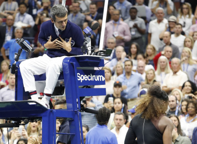 Chair umpire Carlos Ramos talks to Serena Williams after match point after her straight sets defeat to Naomi Osaka of Japan at the US Open Women's Final.