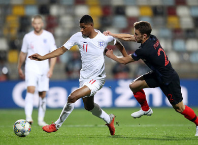 Rashford gets away from Croatia's Josip Pivaric.