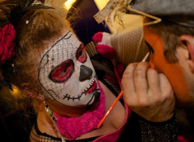 Face painting ahead of the Dragon of Shandon parade.