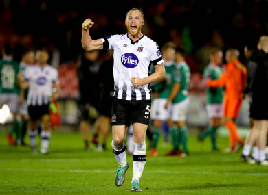Shields punches the air after beating Cork City at Turner's Cross.