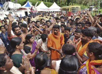 Protestors gather at Nilackal, a base camp on way to the mountain shrine in Kerala, India