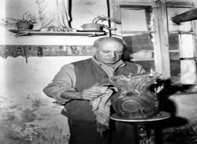 Pablo Picasso, 66, paints an urn in the pottery workshop of Madame Ramie at Vallauris on the French Riviera, 1948.