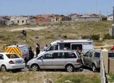 The car, centre, in which the woman's body was found.
