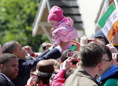 Oh baby! This little girl doesn't know it yet, but this is the day she was cuddled by US President Barack Obama on his trip to Moneygall