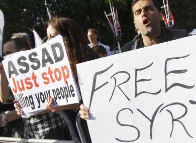 Demonstrators outside Buckingham Palace during the state visit of US President Barack Obama