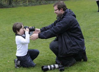 Press photographer Niall Carson pictured here on the other side of the camera recently