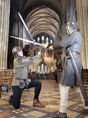 Costumed soldiers at St Patrick's Cathedral reenact the battle between two feuding families, the Butlers and Fitzgeralds, as part of National Heritage Week.