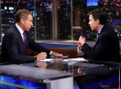 NBC News anchor Brian Williams, left, talks with Bob Costas about Costas' interview with Jerry Sandusky.