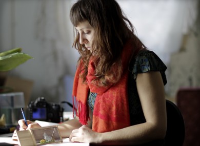 Amber Hansen works in her studio in Lawrence, Kansas