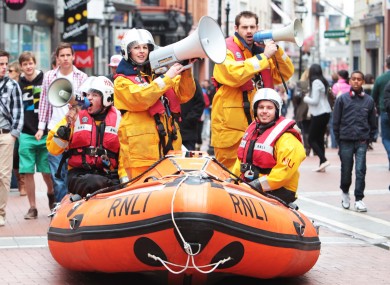 It wasn't THAT rainy, surely? RNLI volunteers launch their annual MAYDAY fundraising campaign on Grafton Street today.