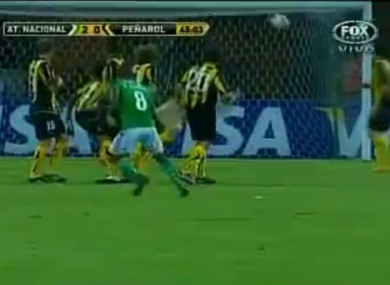 Pabón wheels away as the ball sails towards the top corner.