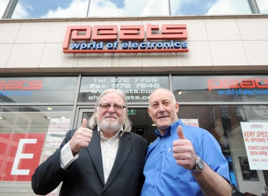 Ben Peat, left, and his nephew Ken Peat, who is sales director of Peats Electronics, outside the Parnell Street branch when it reopened on 28 April.