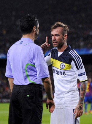 Chelsea's Raul Meireles berates an official during the Champions League semi-final at the Camp Nou.